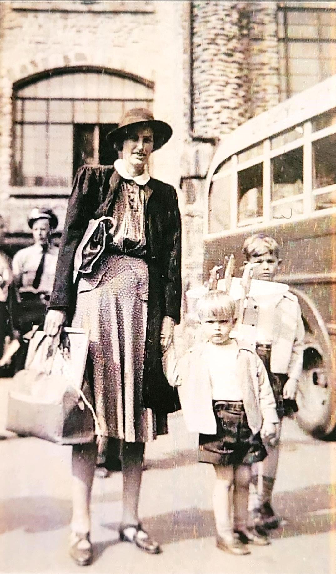 Woman with two young boys.